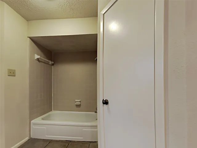 a bathroom with a bathtub