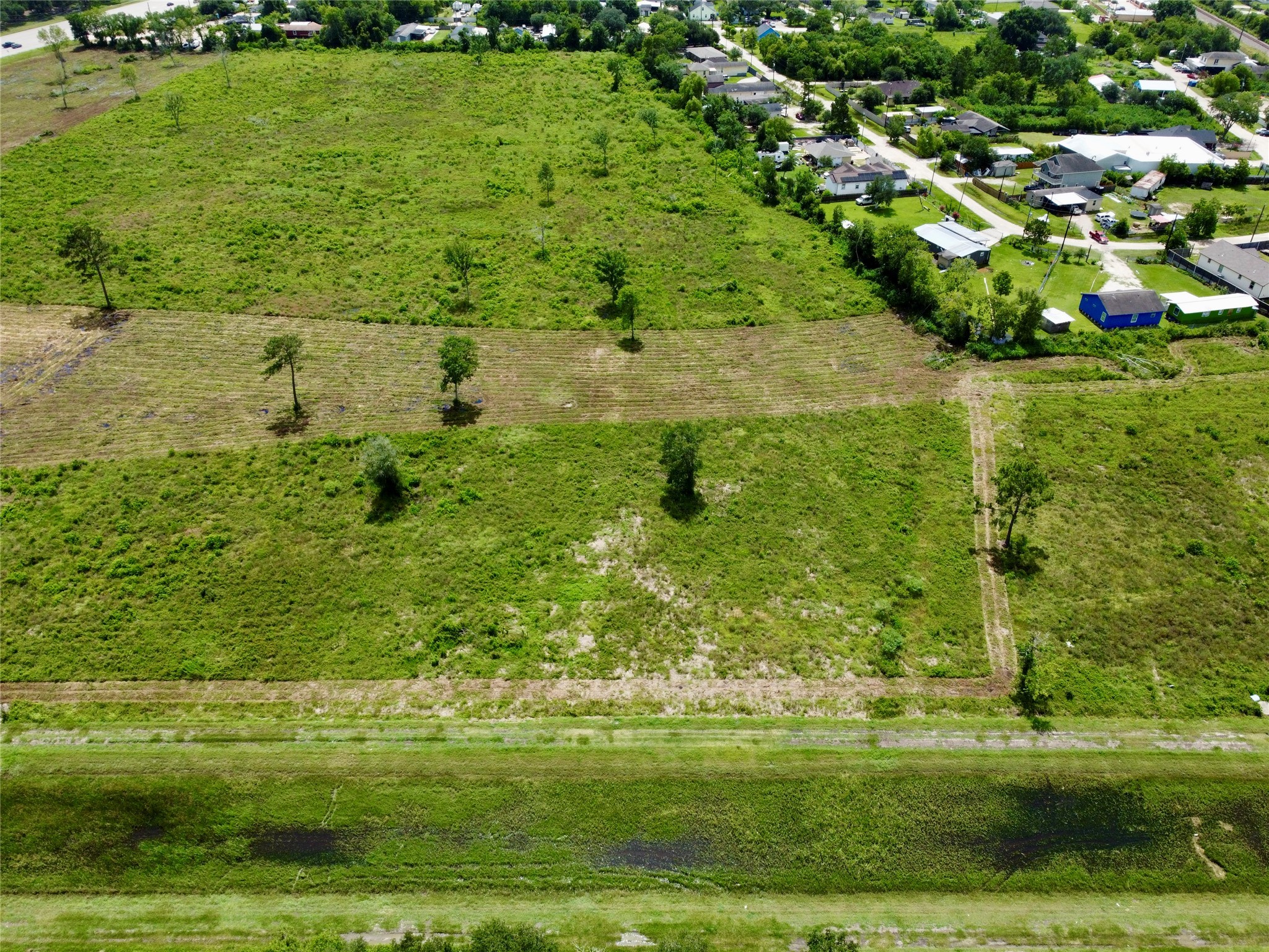 0 Judy Street Rosharon, TX 77583 - Photo 4 of 15 a view of a green yard
