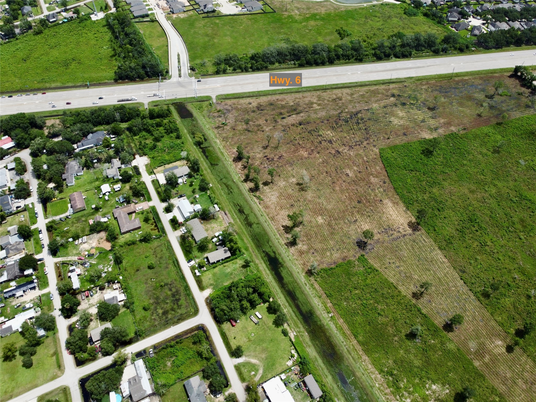 0 Judy Street Rosharon, TX 77583 - Photo 5 of 15 a view of a lush green field