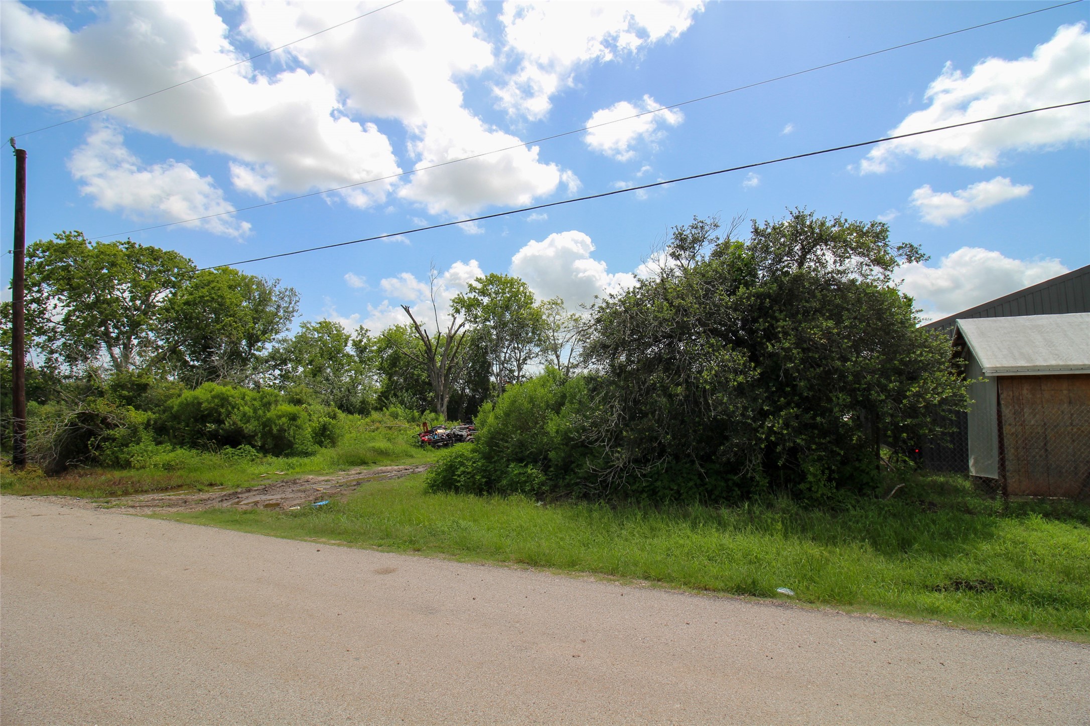 0 Judy Street Rosharon, TX 77583 - Photo 10 of 15 a backyard of a house with lots of green space