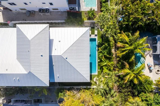 a view of a balcony with furniture