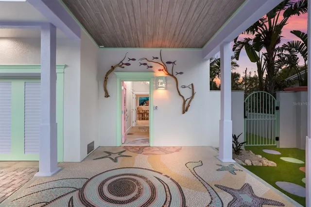 a view of front door with wooden floor