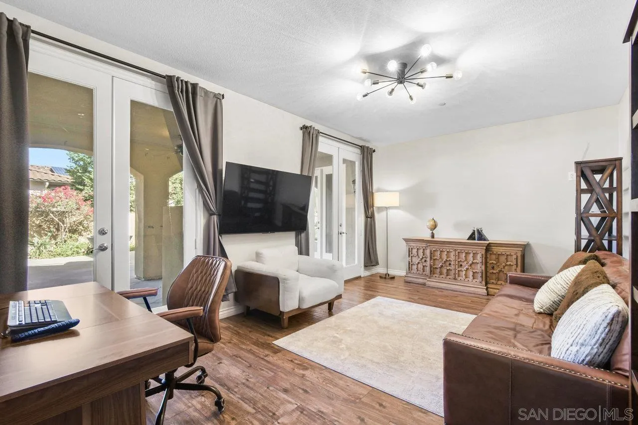 2957 Ranch Gate Road Chula Vista, CA 91914 - Photo 23 of 72 a living room with furniture and a flat screen tv