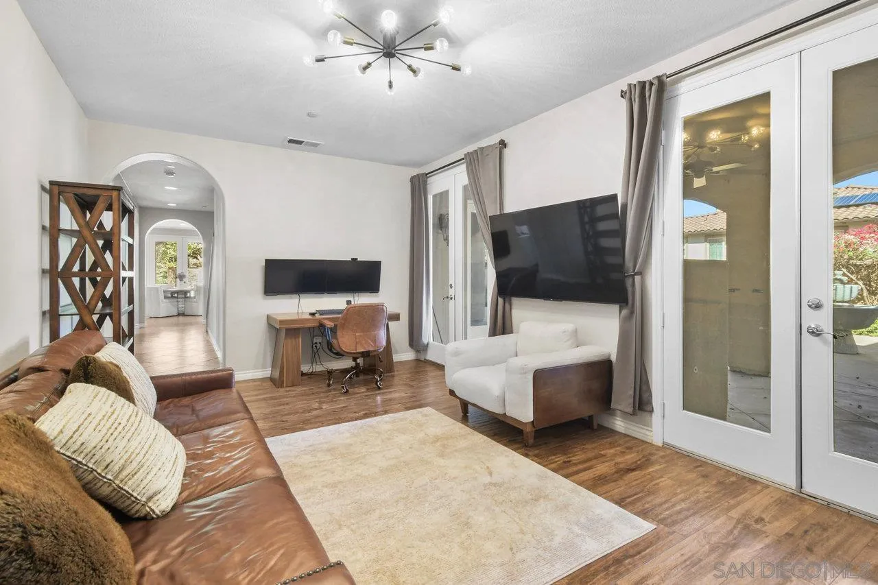 2957 Ranch Gate Road Chula Vista, CA 91914 - Photo 24 of 72 a living room with furniture and a flat screen tv