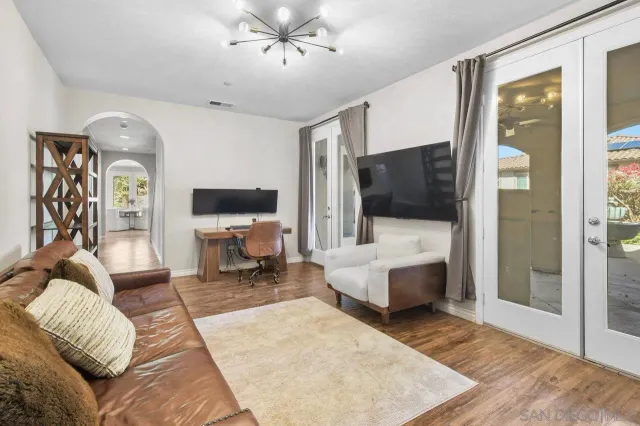 a view of a hallway with stairs