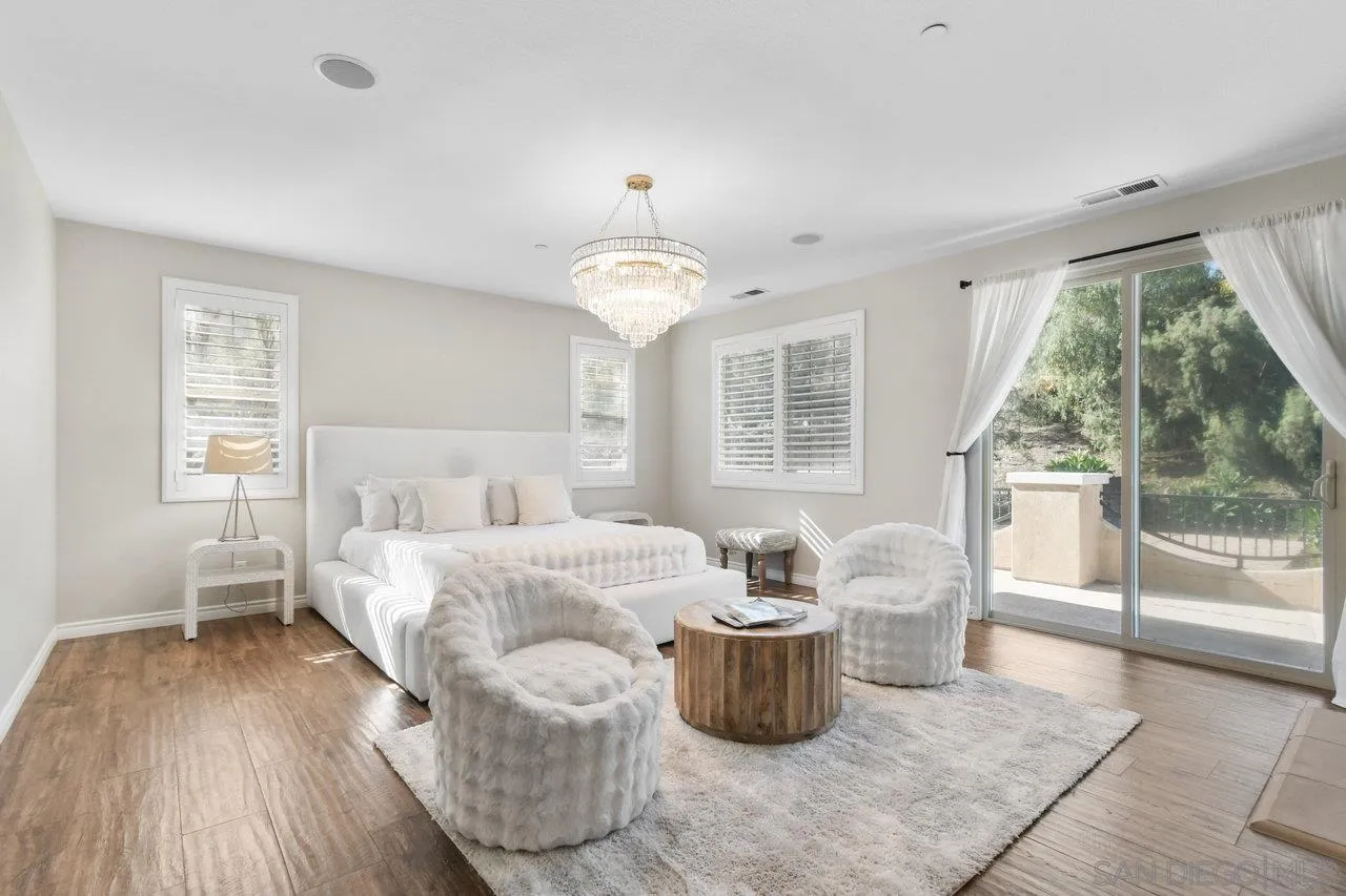 2957 Ranch Gate Road Chula Vista, CA 91914 - Photo 35 of 72 a living room with furniture and a chandelier