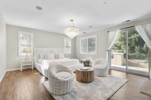 a bath tub sitting in a bathroom next to a window