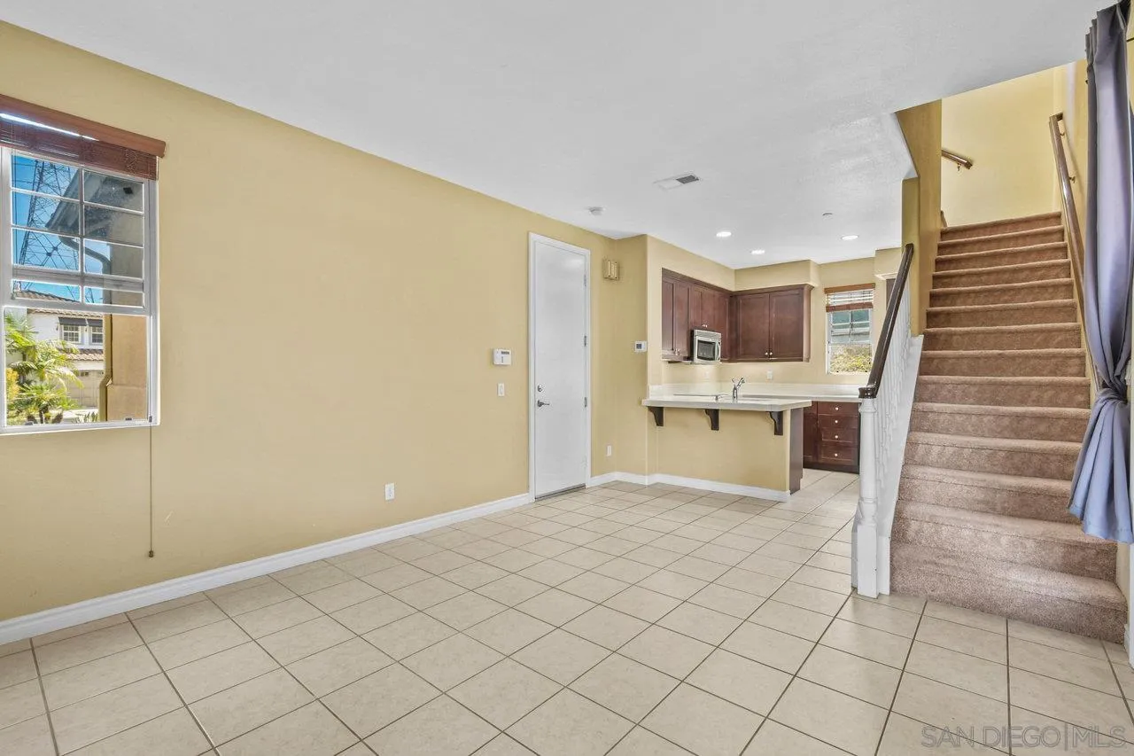 2957 Ranch Gate Road Chula Vista, CA 91914 - Photo 52 of 72 a view of a kitchen with wooden floor and a sink
