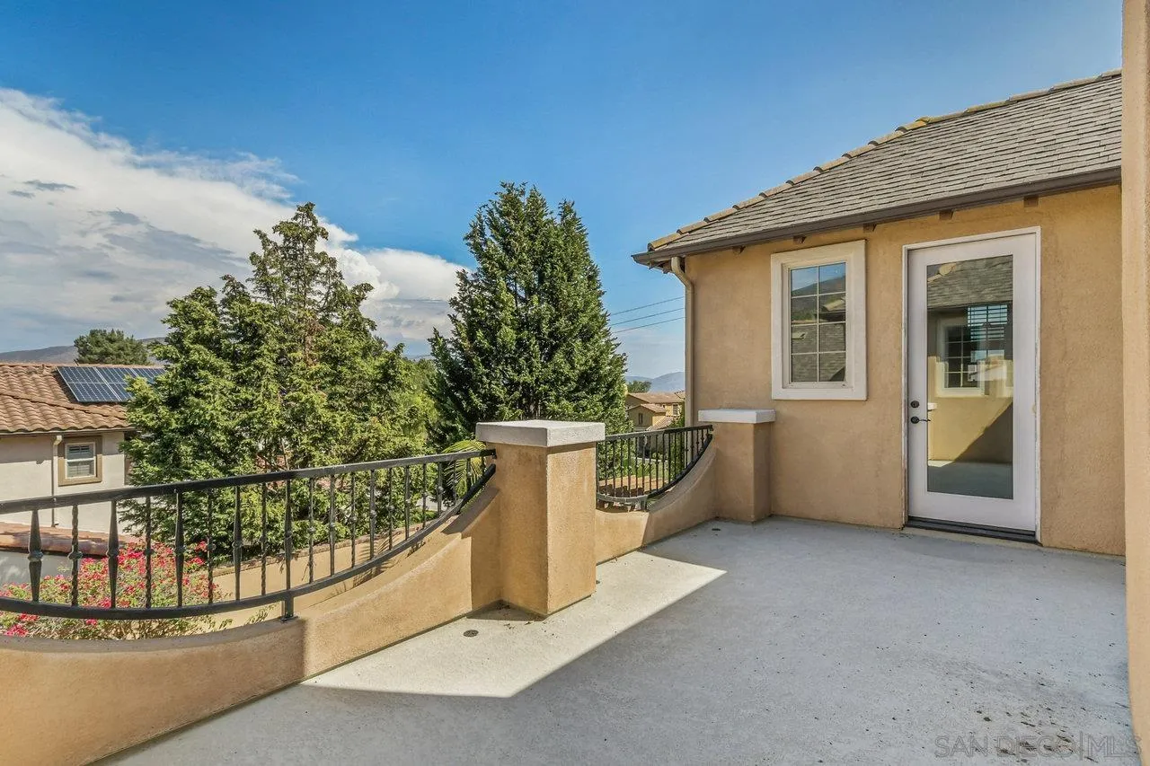 2957 Ranch Gate Road Chula Vista, CA 91914 - Photo 66 of 72 a view of a house with a tree