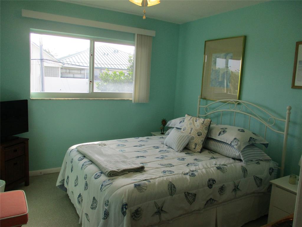 2100 Northeast 38th Street, Unit 217 Lighthouse Point, FL 33064 - Photo 11 of 28 2nd Bedroom with nice natural light.