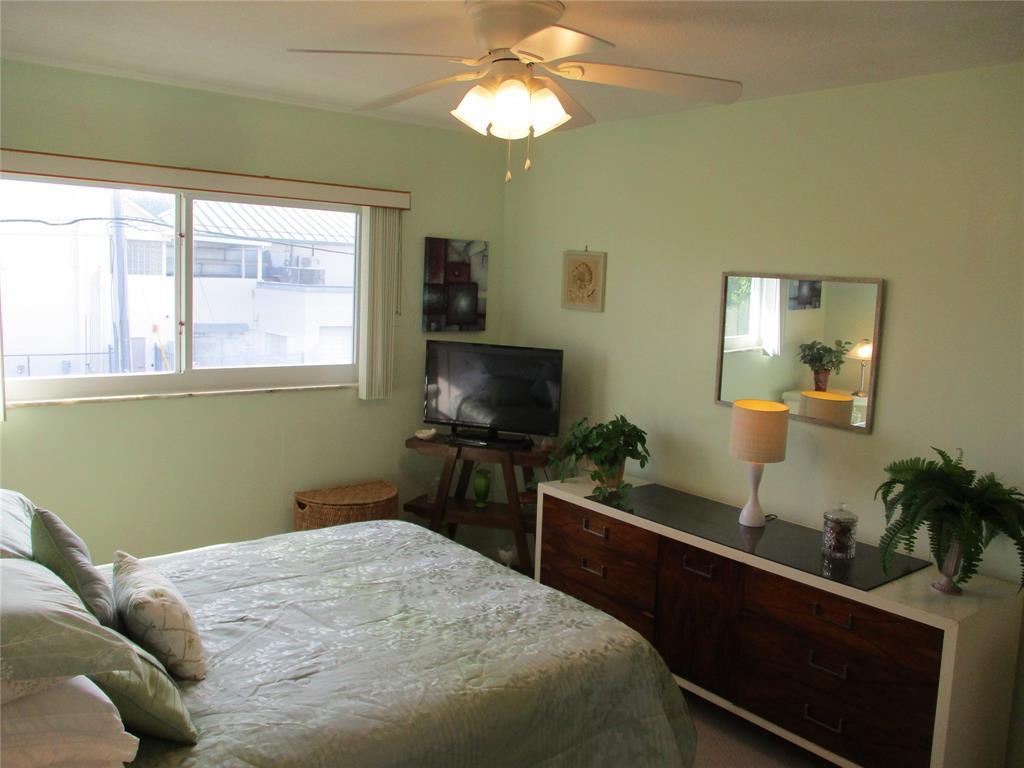 2100 Northeast 38th Street, Unit 217 Lighthouse Point, FL 33064 - Photo 2 of 28 Main bedroom.