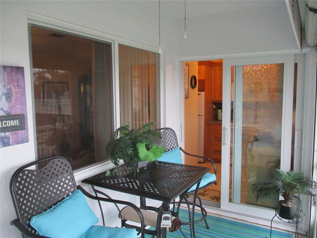 2100 Northeast 38th Street, Unit 217 Lighthouse Point, FL 33064 - Photo 23 of 28 Lovely Lanai!