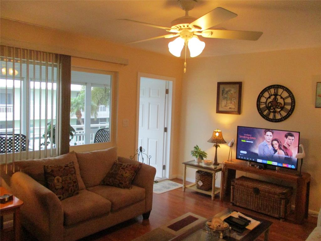 2100 Northeast 38th Street, Unit 217 Lighthouse Point, FL 33064 - Photo 24 of 28 Living room.