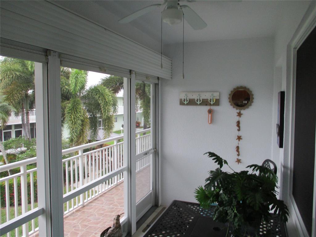 2100 Northeast 38th Street, Unit 217 Lighthouse Point, FL 33064 - Photo 27 of 28 Looking out from the Lanai.