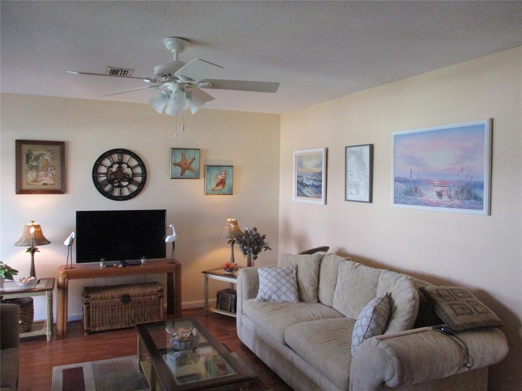 2100 Northeast 38th Street, Unit 217 Lighthouse Point, FL 33064 - Photo 3 of 28 Living room area.