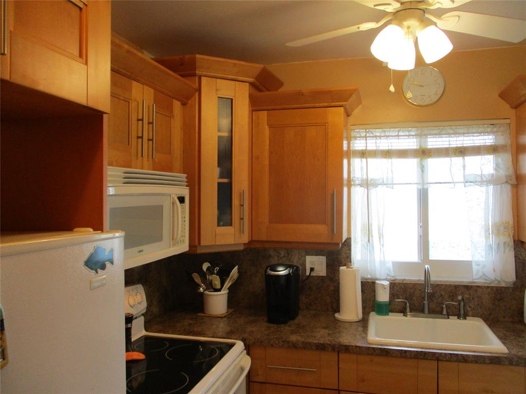 2100 Northeast 38th Street, Unit 217 Lighthouse Point, FL 33064 - Photo 5 of 28 Updated Kitchen
