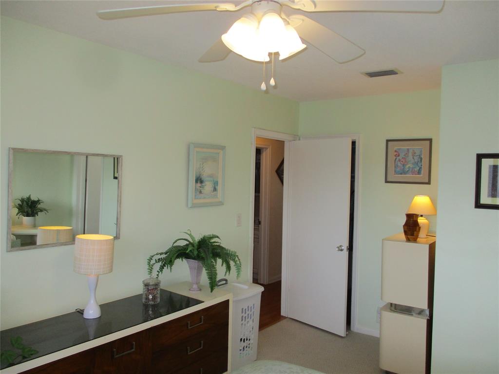 2100 Northeast 38th Street, Unit 217 Lighthouse Point, FL 33064 - Photo 8 of 28 Main bedroom with walkin closet.