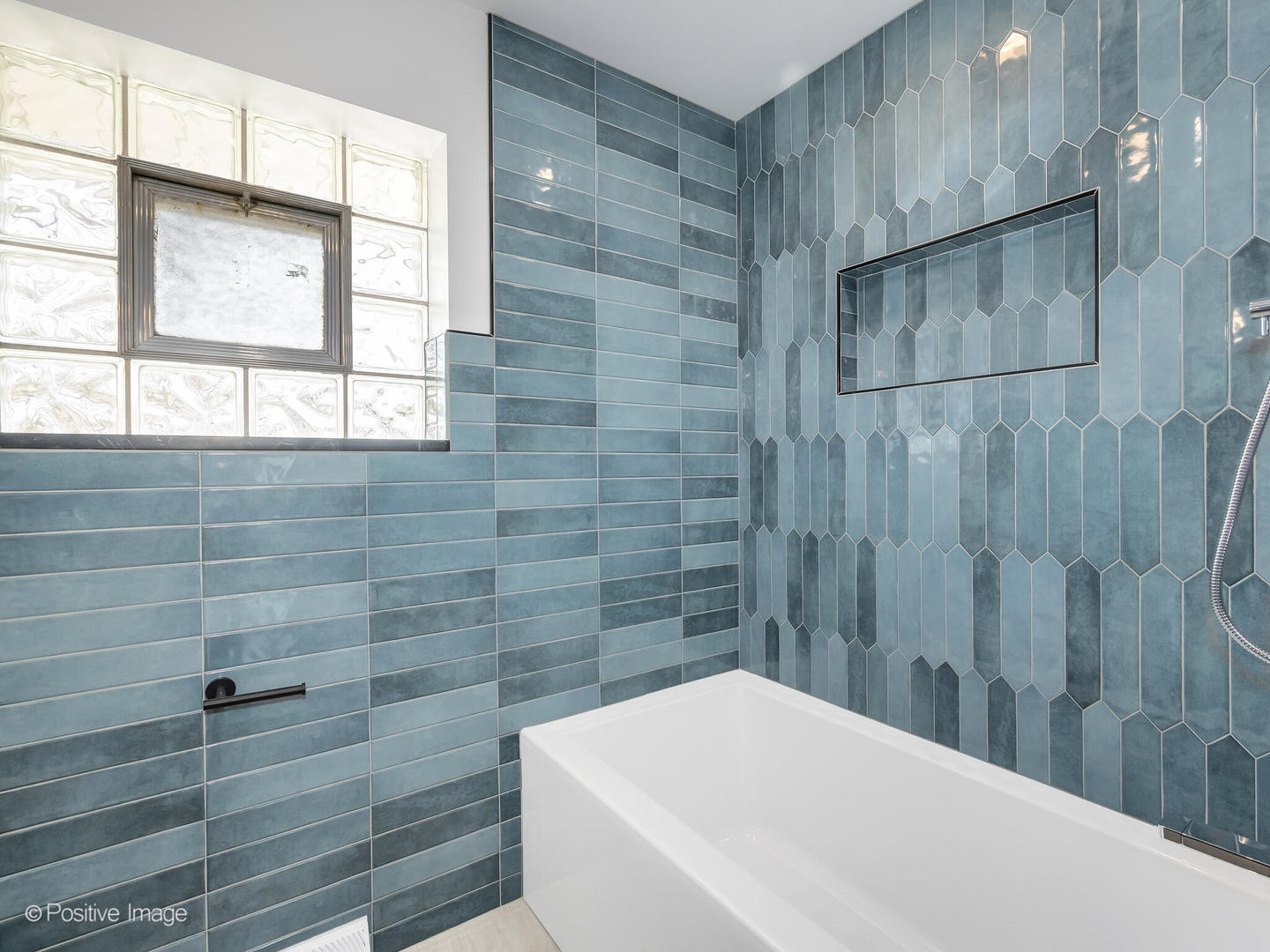 284 Blackhawk Road Riverside, IL 60546 - Photo 19 of 36 a bathroom with a bathtub and shower