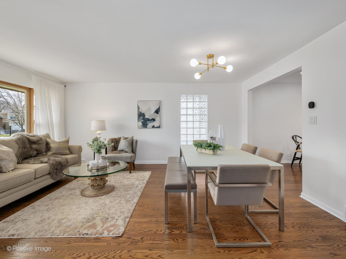 284 Blackhawk Road Riverside, IL 60546 - Photo 6 of 36 a living room with furniture a window and a table