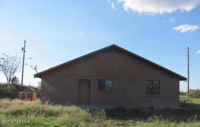 1017 Calle Tamaulipas Rio Rico, AZ 85648 - Photo 2 of 7 a backyard of a house with lots of green space