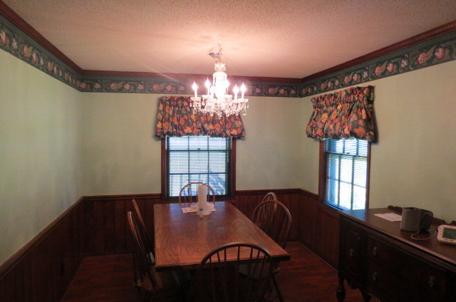382 Stone Edge Road Macon, GA 31210 - Photo 5 of 22 a view of a dining room with furniture and chandelier