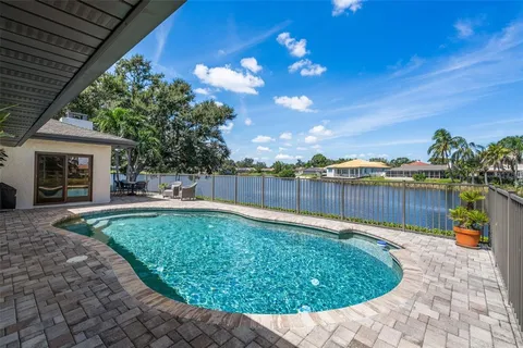 a view of a backyard with a patio