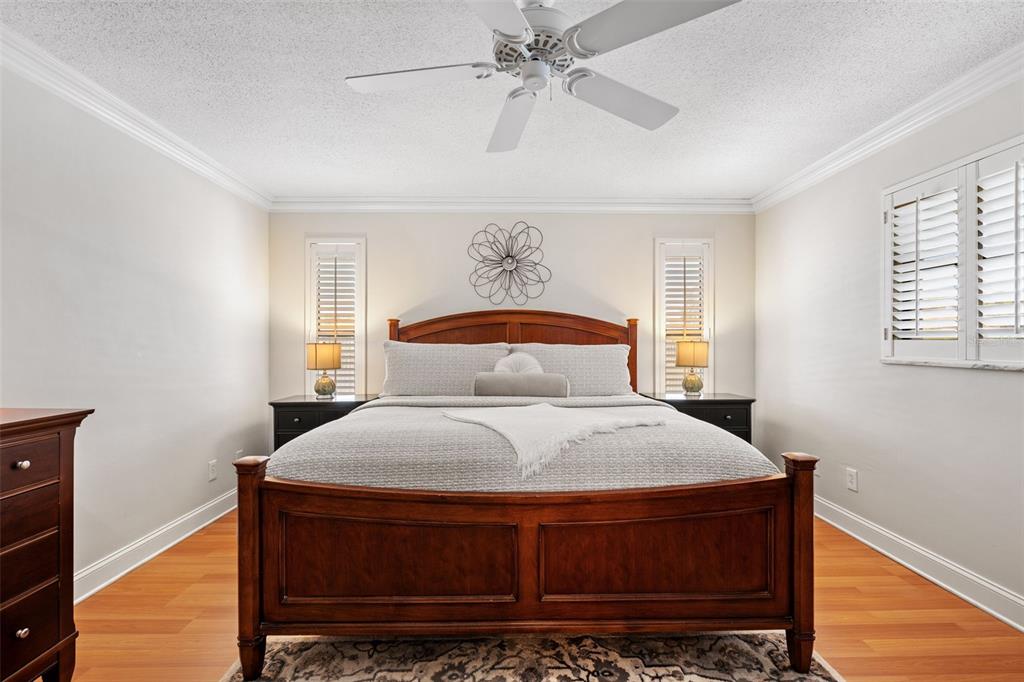 657 Riviera Bay Drive Northeast St. Petersburg, FL 33702 - Photo 25 of 50 a bedroom with a bed and window