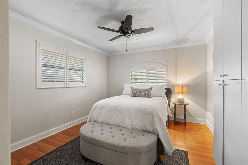 657 Riviera Bay Drive Northeast St. Petersburg, FL 33702 - Photo 35 of 50 a bedroom with a bed and window