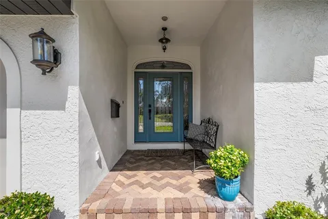 a front view of a house with a porch