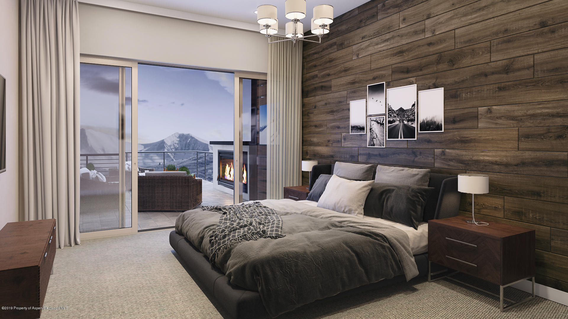 300 Overlook Ridge Basalt, CO 81621 - Photo 6 of 9 a bed room with a bed and a chandelier