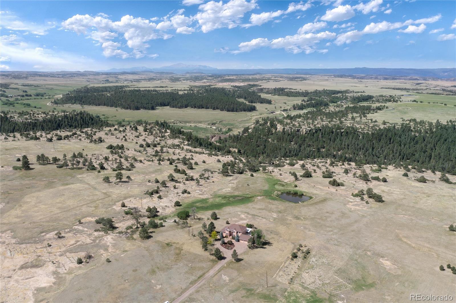 897 East Rim Road Franktown, CO 80116 - Photo 31 of 32 a view of a sky view