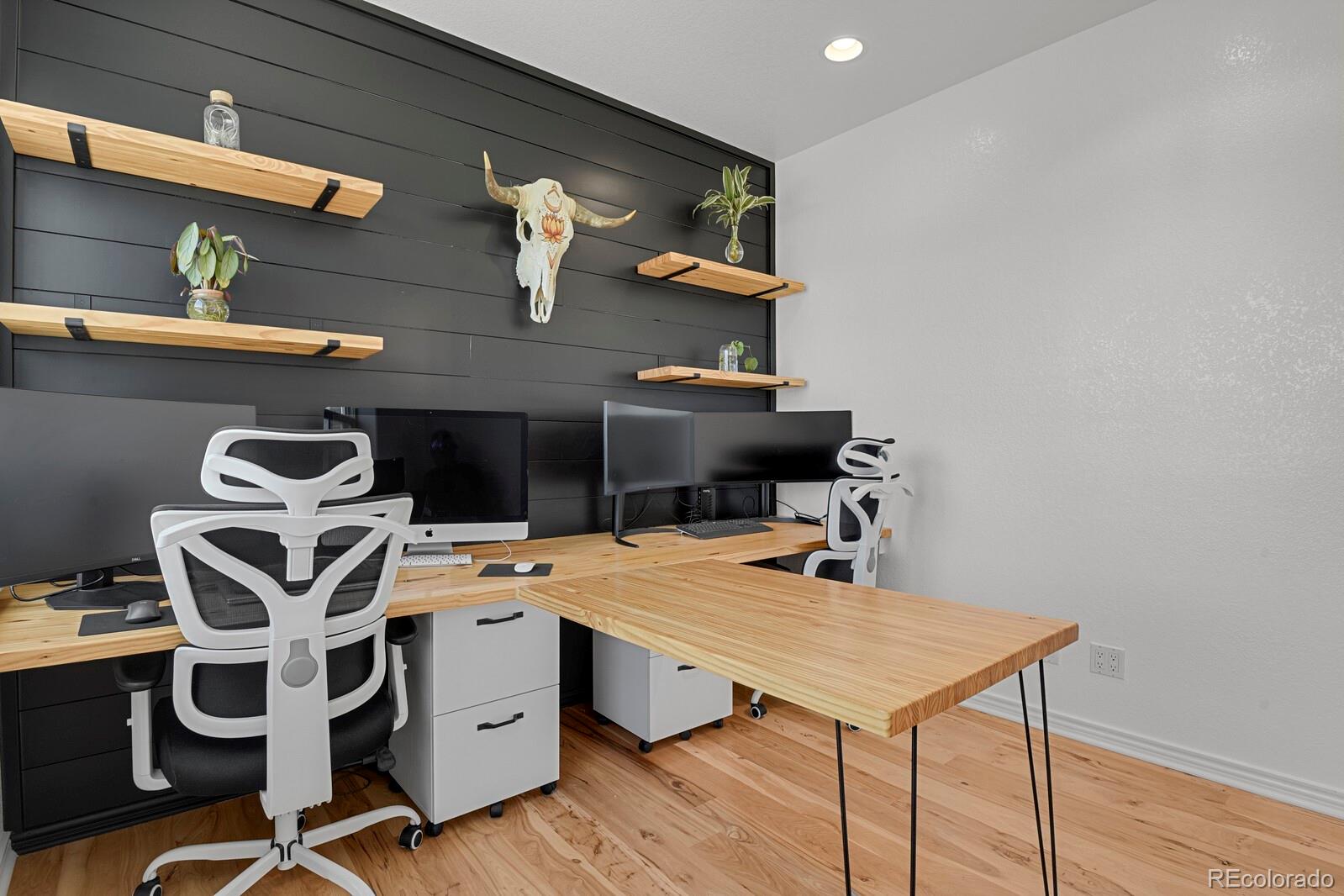 897 East Rim Road Franktown, CO 80116 - Photo 4 of 32 a room with gym equipment