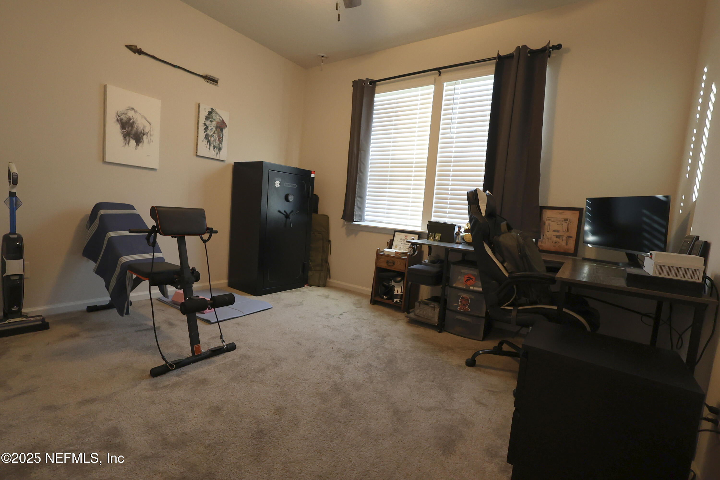 138 Lambert Road St. Johns, FL 32259 - Photo 37 of 50 a view of a workspace with furniture and a window