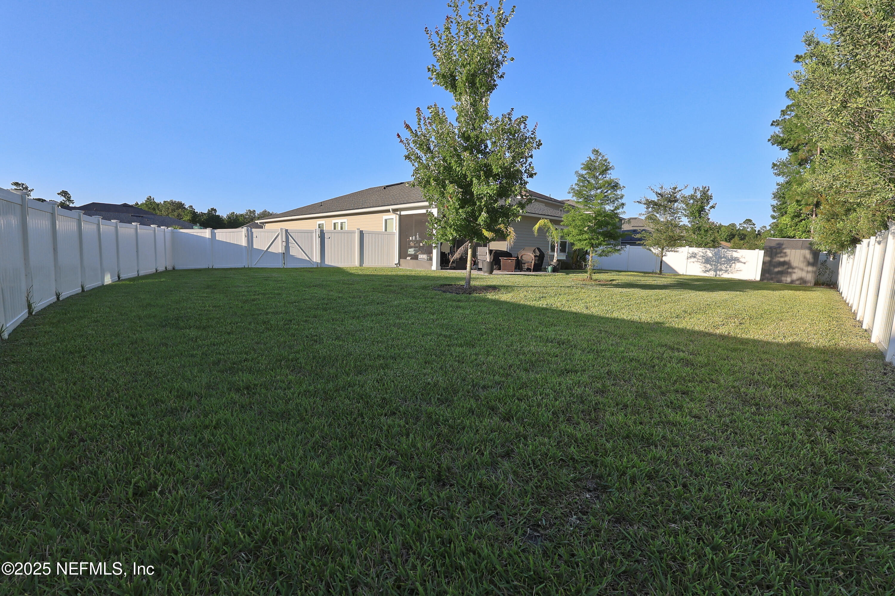 138 Lambert Road St. Johns, FL 32259 - Photo 44 of 50 a view of a house with a big yard