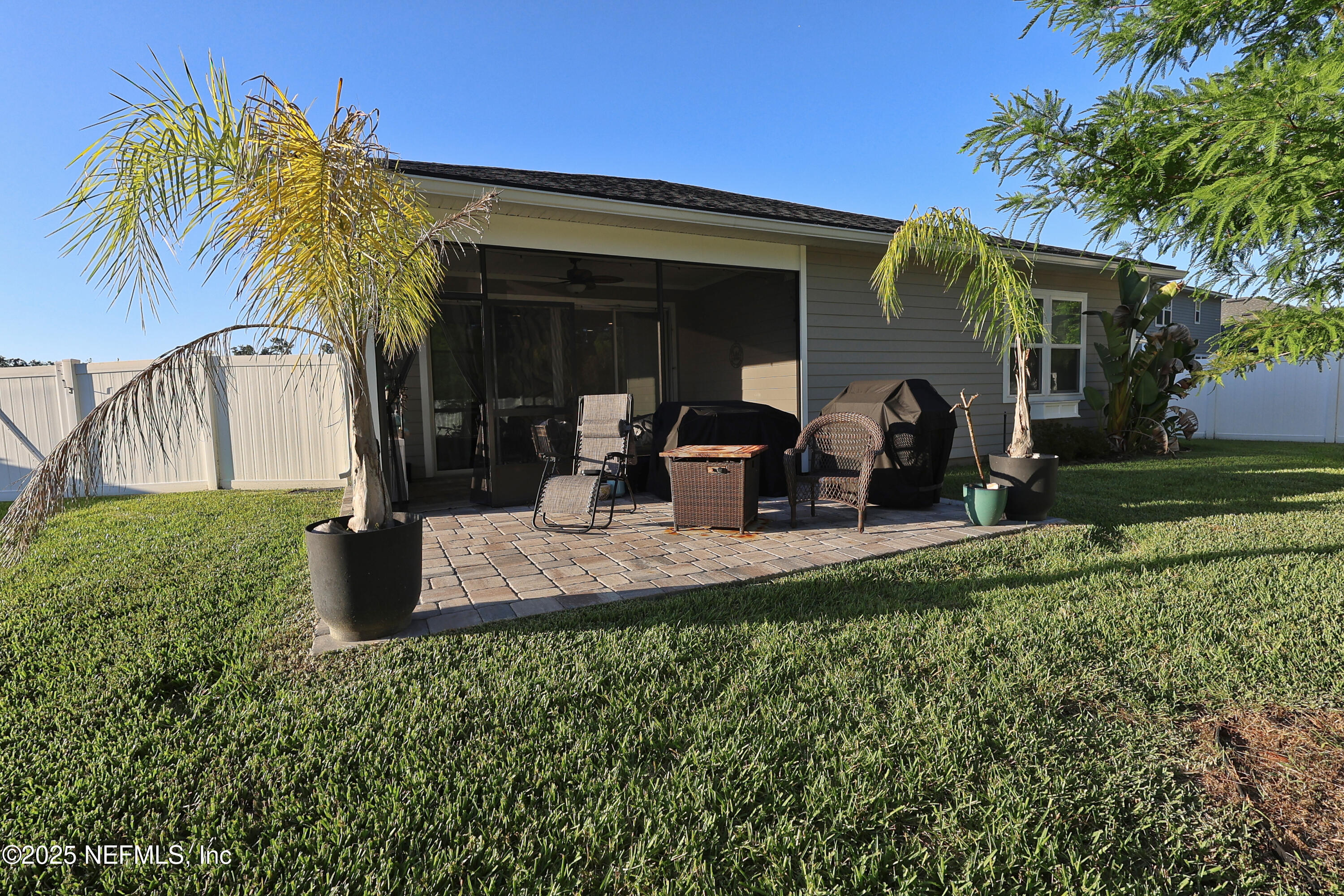 138 Lambert Road St. Johns, FL 32259 - Photo 45 of 50 a view of a house with backyard and sitting area
