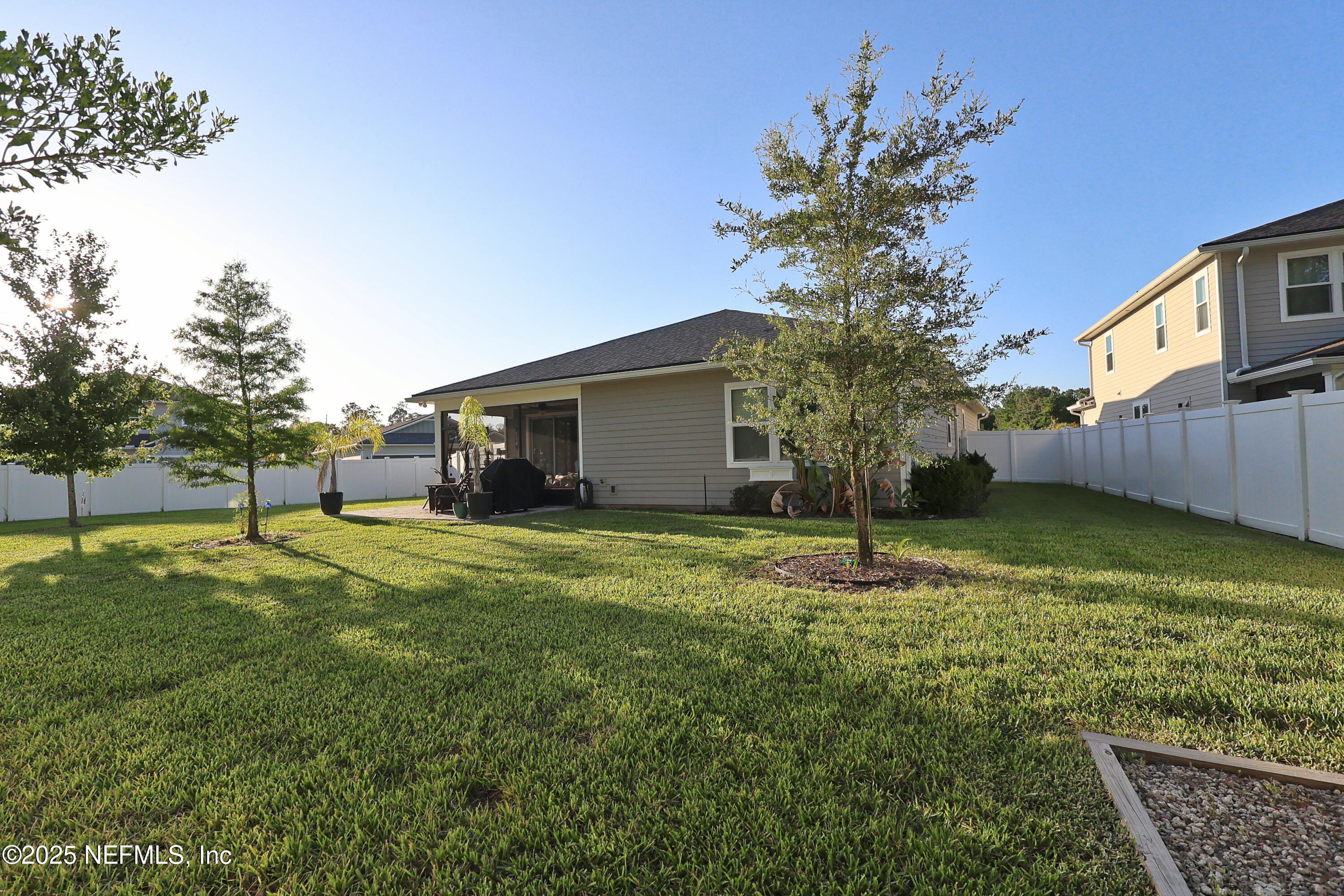 138 Lambert Road St. Johns, FL 32259 - Photo 47 of 50 a backyard of a house with lots of green space