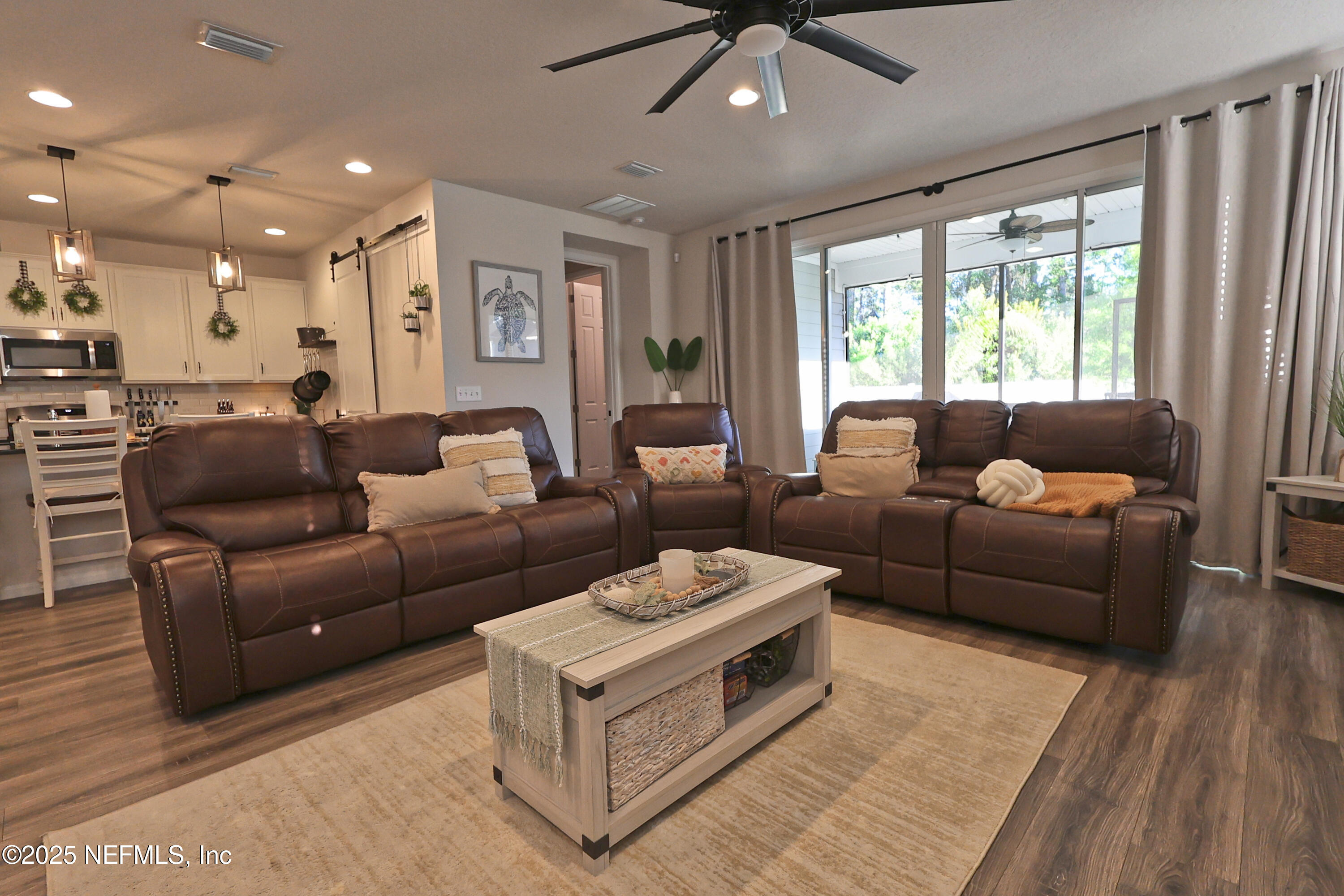 138 Lambert Road St. Johns, FL 32259 - Photo 10 of 50 a living room with furniture and a large window