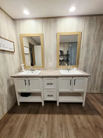 a bathroom with a bathtub and shower