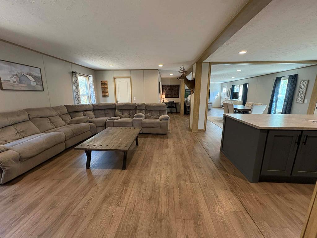 103 Appaloosa Road Buena Vista, GA 31803 - Photo 9 of 24 a living room with furniture and a wooden floor