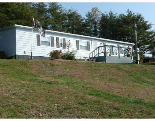 3494 Ridge Road Aliquippa, PA 15001 - Photo 1 of 12 Exterior Front. WELL MAINTAINED AND UPDATED THREE BEDROOM RANCH WITH DEN ON OVER 2 ACRES