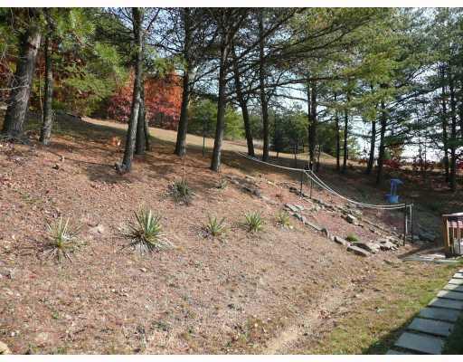 3494 Ridge Road Aliquippa, PA 15001 - Photo 11 of 12 Exterior Back. WOODED BACK YARD SETTING