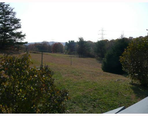 3494 Ridge Road Aliquippa, PA 15001 - Photo 9 of 12 Exterior Front. OVER TWO ACRES OFFERS A SERENE PRIVATE SETTING