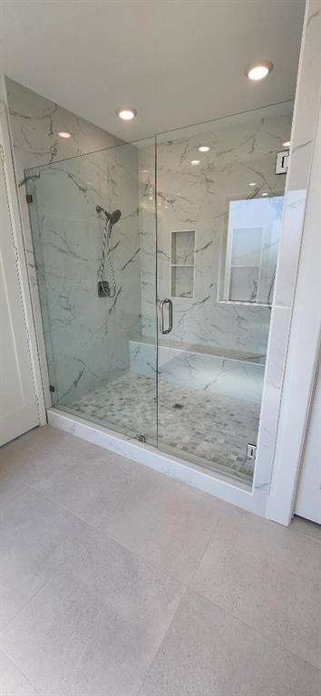 3338 Sylvan Avenue Dallas, TX 75212 - Photo 12 of 13 Bathroom with a marble finish shower and recessed lighting