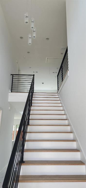 3338 Sylvan Avenue Dallas, TX 75212 - Photo 4 of 13 Stairway featuring attic access
