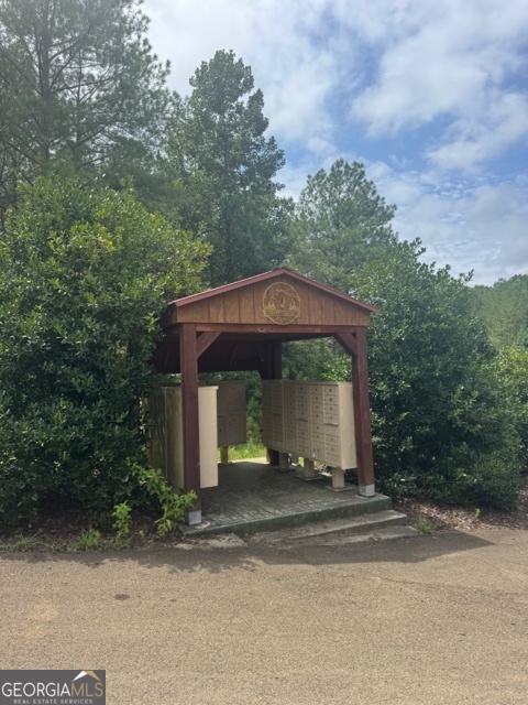 43-44 Reece Mountain Road Ellijay, GA 30536 - Photo 24 of 24 a view of a house with a yard