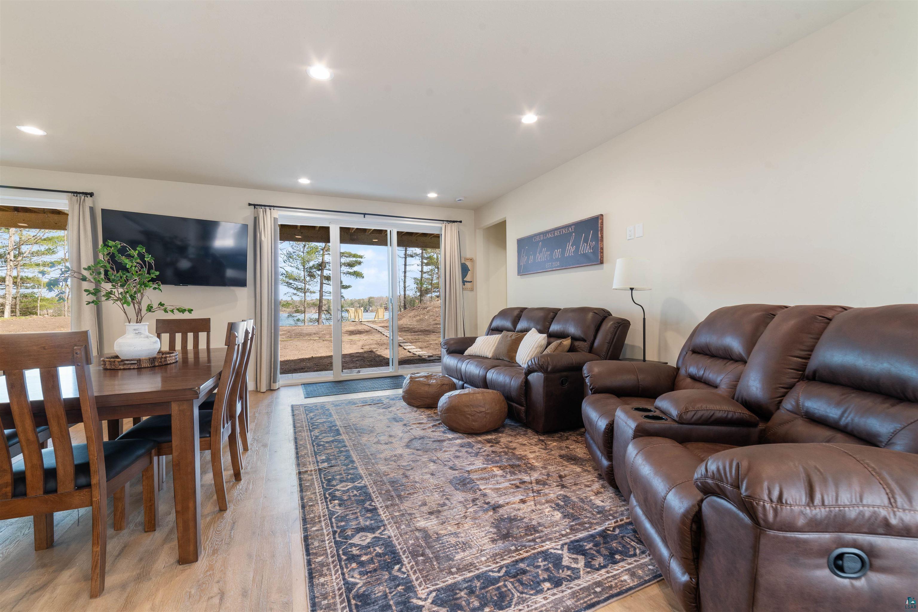 2000 West Chub Lake Road Carlton, MN 55718 - Photo 23 of 30 Open-concept room featuring wood-finish flooring, recessed lighting, and a neutral wall color