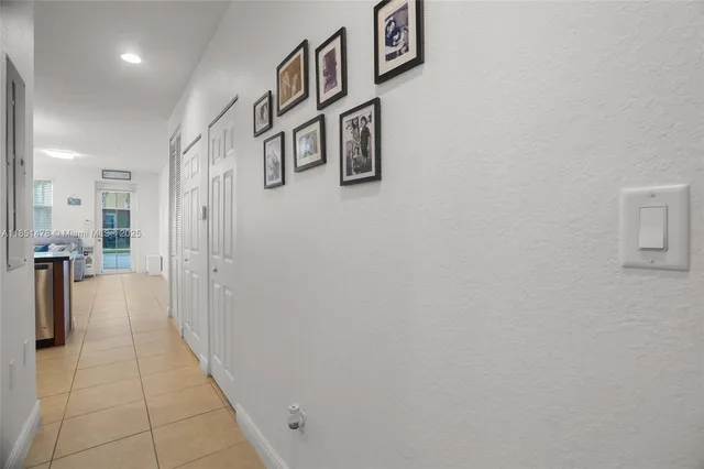 a hallway with cabinets