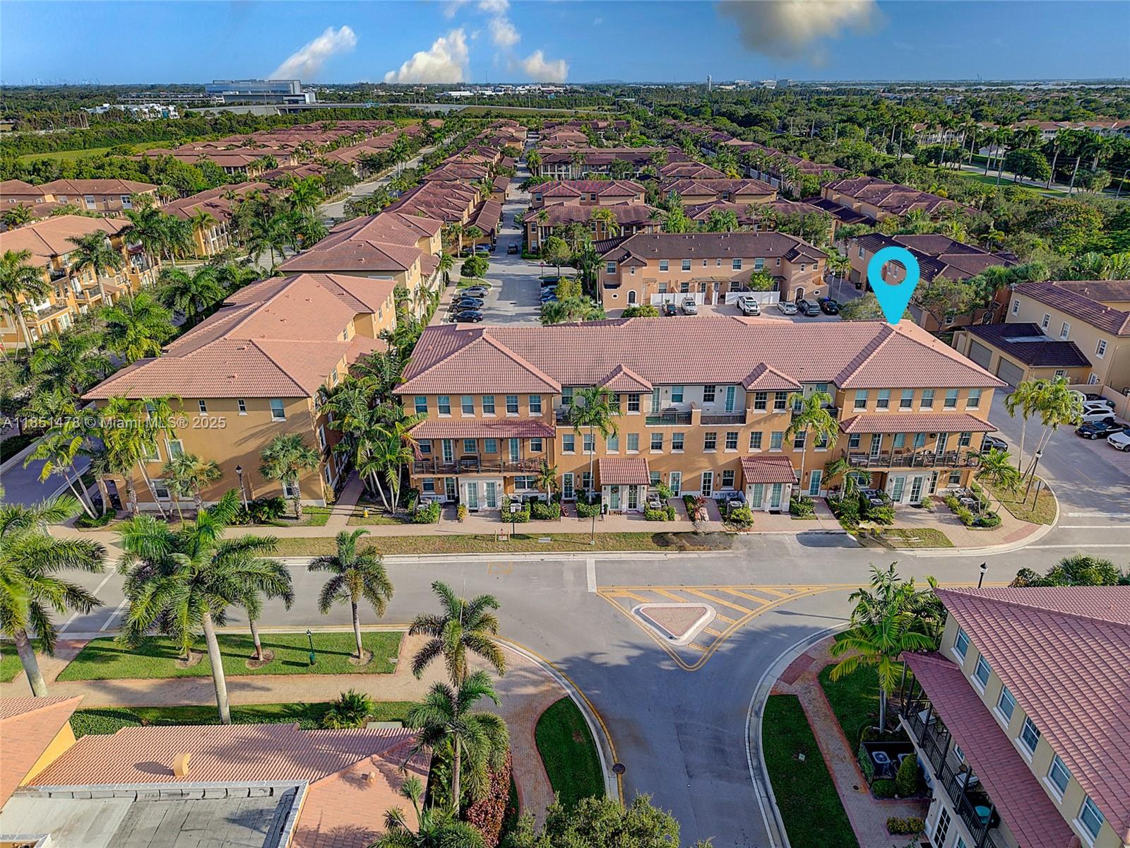 14774 Southwest 10th Street, Unit 10502 Pembroke Pines, FL 33027 - Photo 2 of 40 an aerial view of residential houses and outdoor space