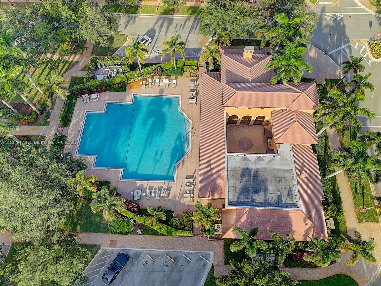 14774 Southwest 10th Street, Unit 10502 Pembroke Pines, FL 33027 - Photo 32 of 40 an aerial view of a house with a garden and yard