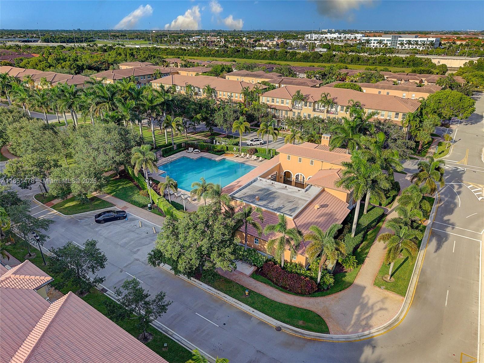 14774 Southwest 10th Street, Unit 10502 Pembroke Pines, FL 33027 - Photo 34 of 40 an aerial view of a house with a garden and lake view
